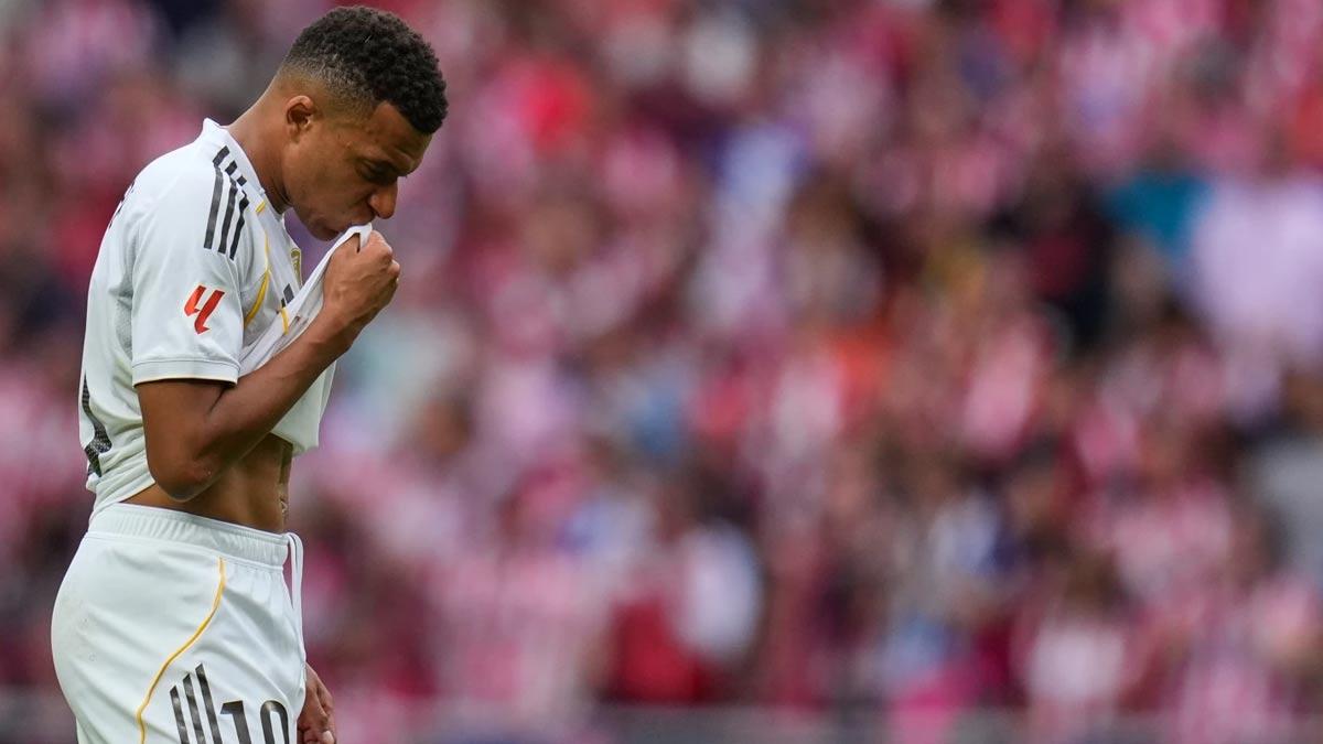 Real Madrid beat nine-man Getafe to top La Liga